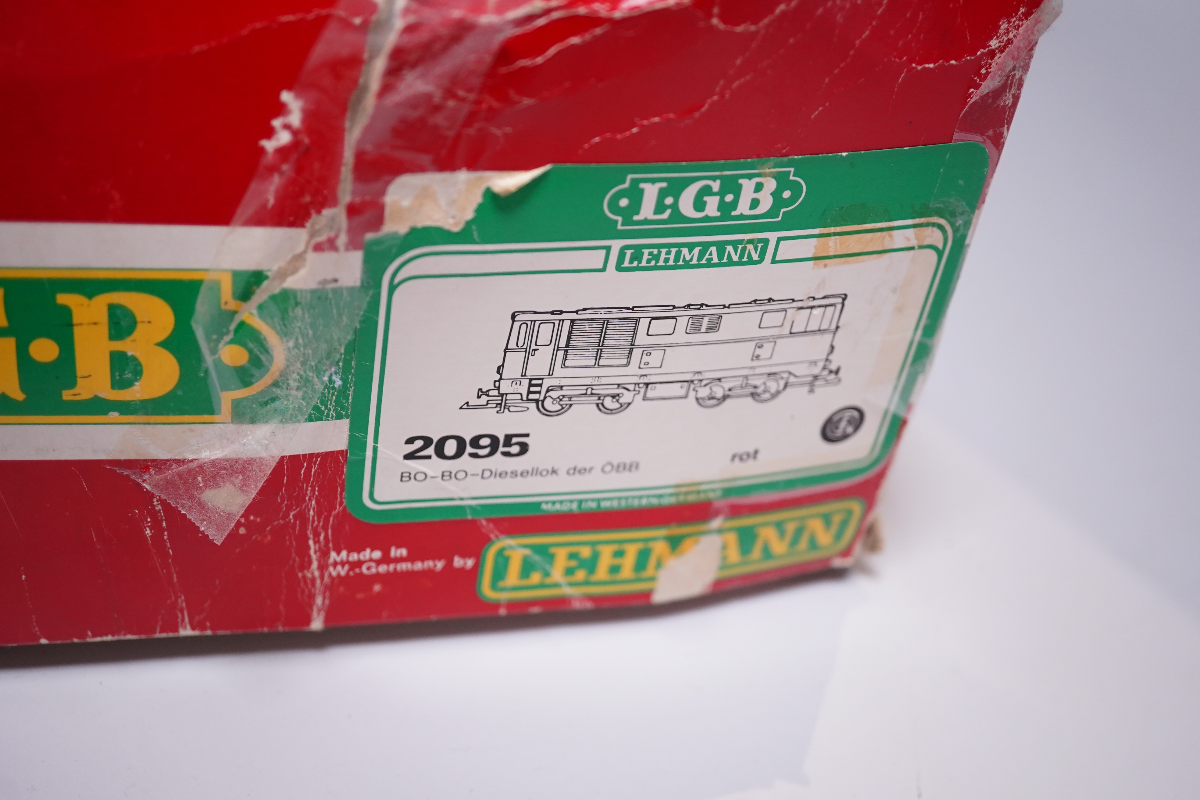 A boxed Lehmann LGB G scale railway OBB Austrian outline Bo-Bo diesel locomotive, 2095.11. Condition - fair, some wear and minor damage, and damage to the box.